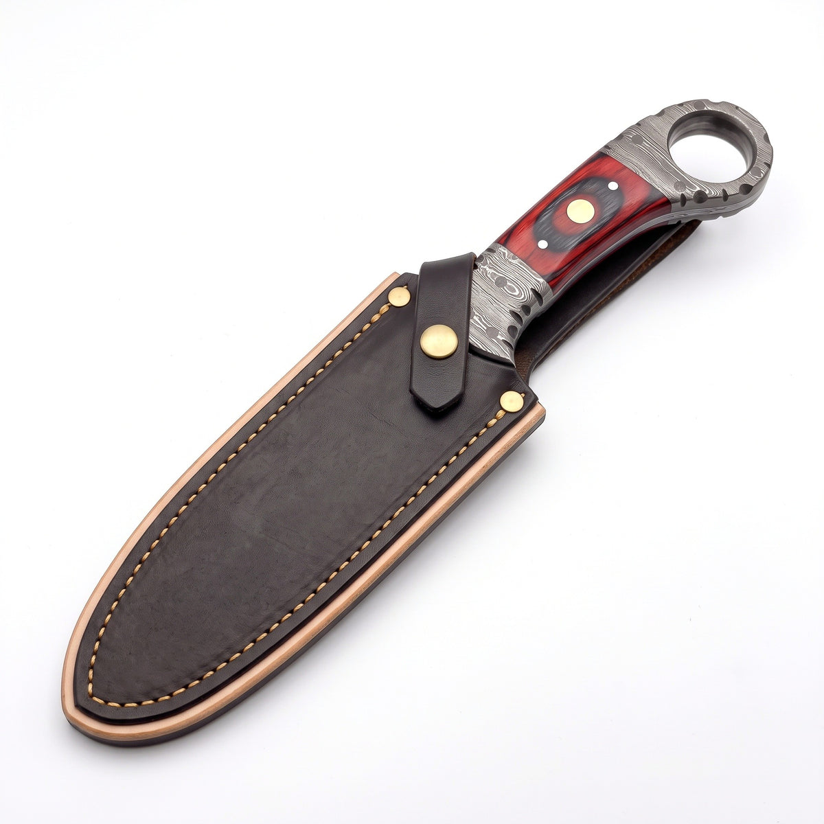Trailhead 7.5" Damascus Skinning Knife | Red Dyed Wood, seated in the Crownridge sheath