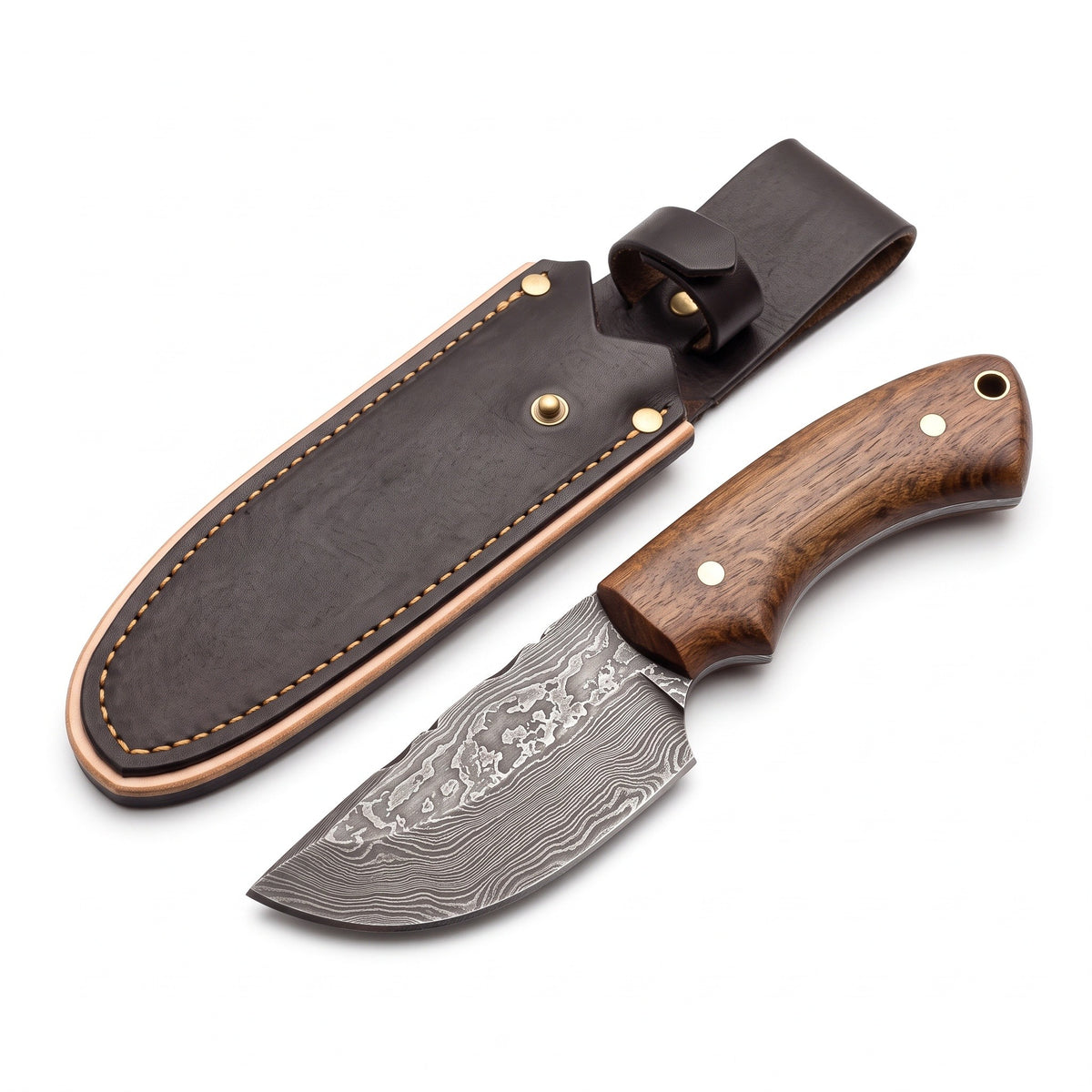 Trailhead 7.5" Damascus Skinning Knife | Walnut, three-quarter view with the Crownridge sheath