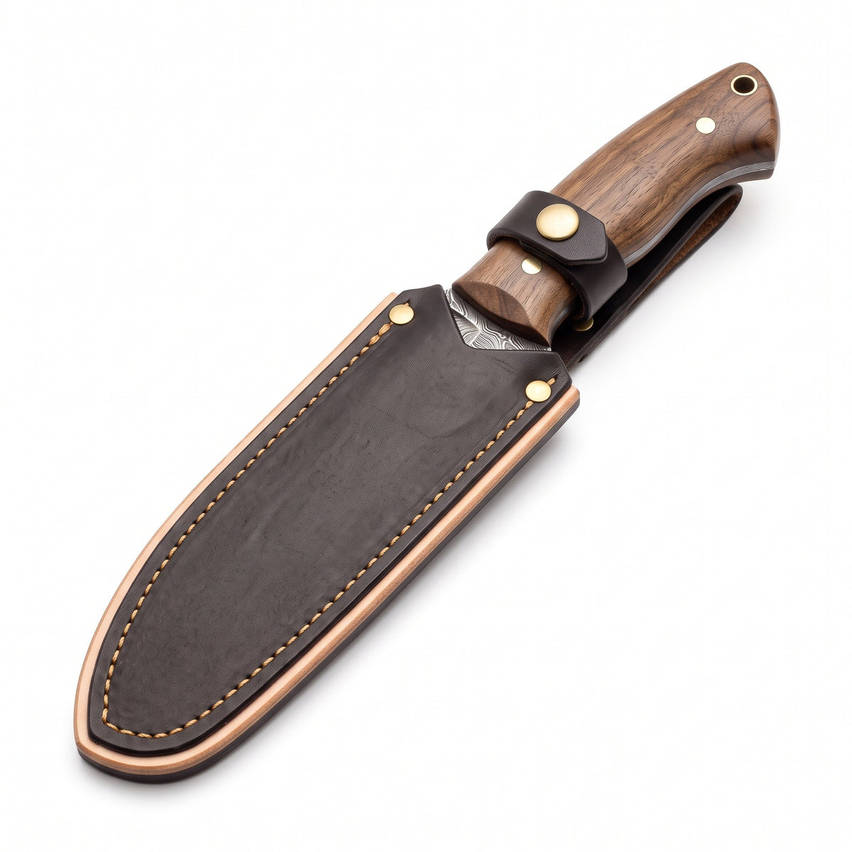 Trailhead 7.5" Damascus Skinning Knife | Walnut, seated in the Crownridge sheath