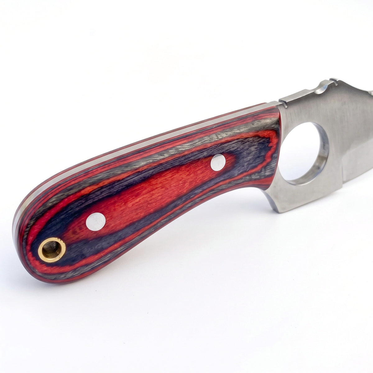 Trailhead 7" Carbon Steel Skinning Knife | Red Dyed Wood, handle and fittings close-up