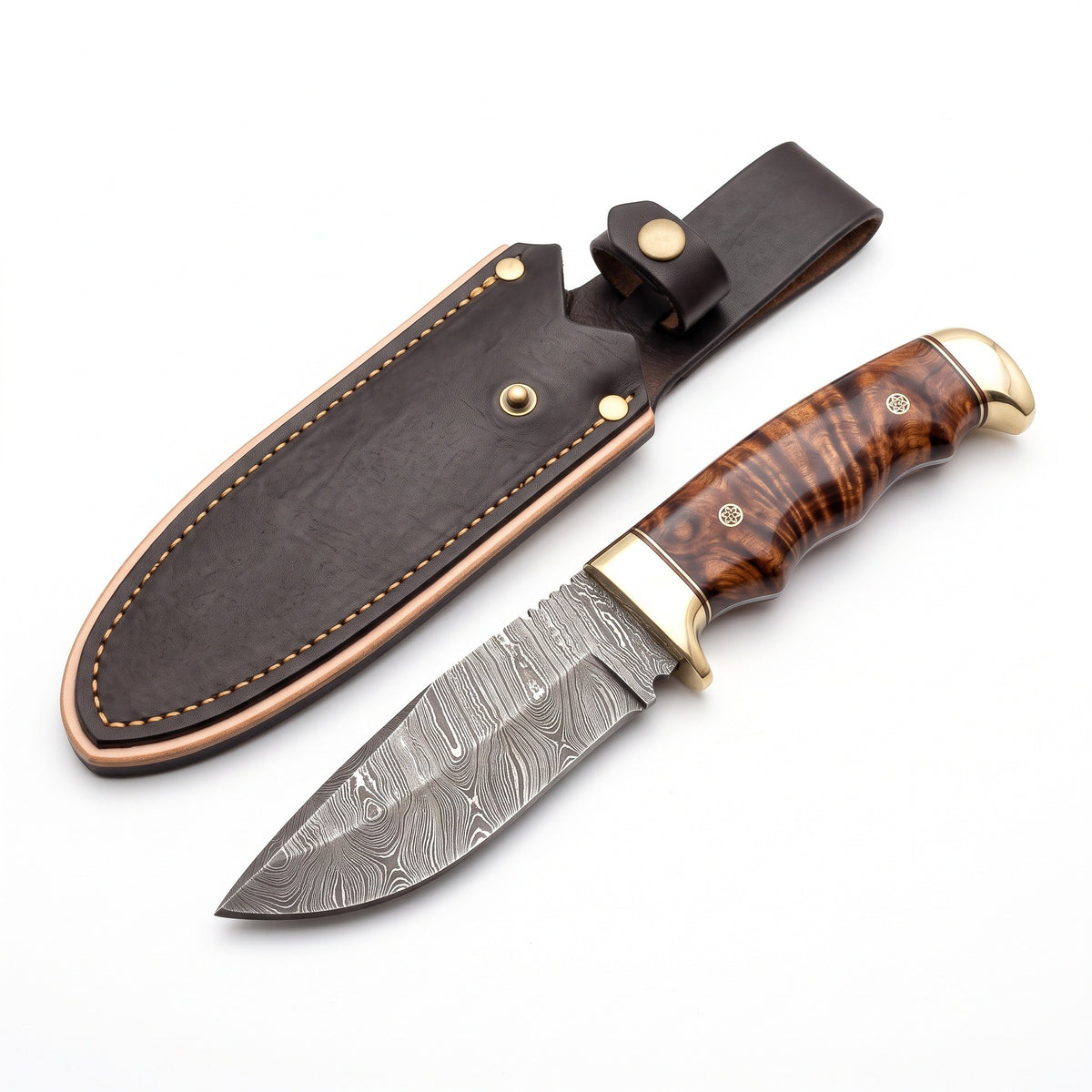 Trailhead 8" Damascus Skinning Knife | Rosewood, three-quarter view with the Crownridge sheath