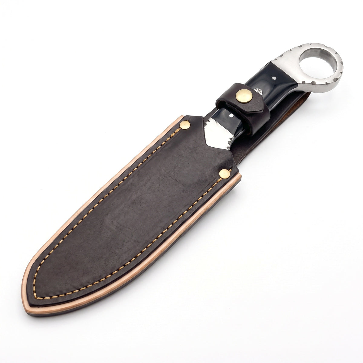 Trailhead 9" Carbon Steel Skinning Knife | Buffalo Horn, seated in the Crownridge sheath