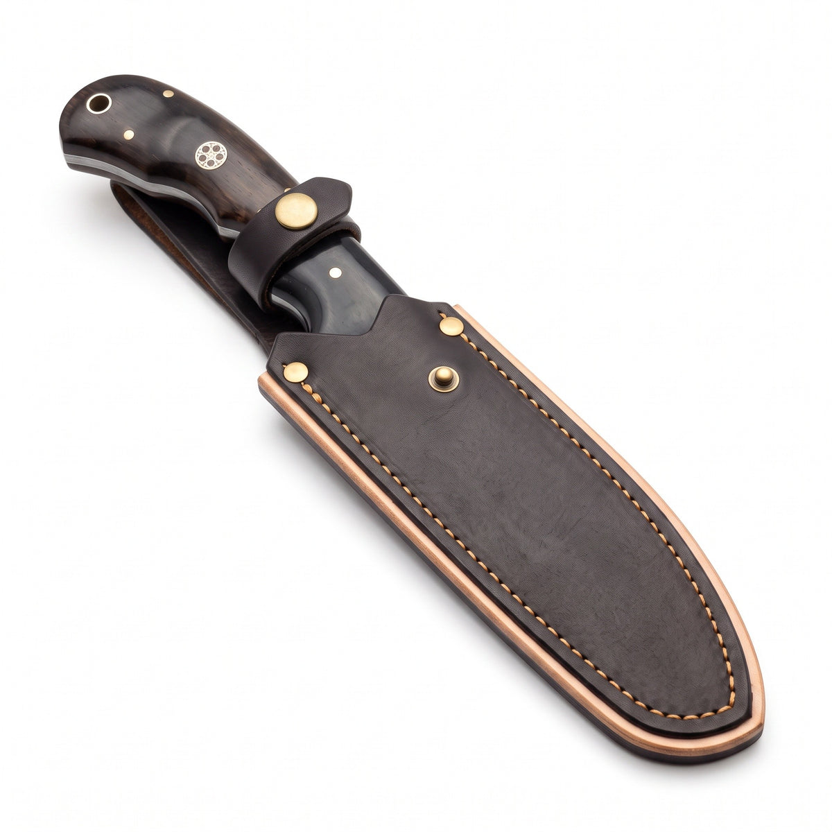 Trailhead 9" Damascus Skinning Knife | Rosewood & Horn, seated in the Crownridge sheath